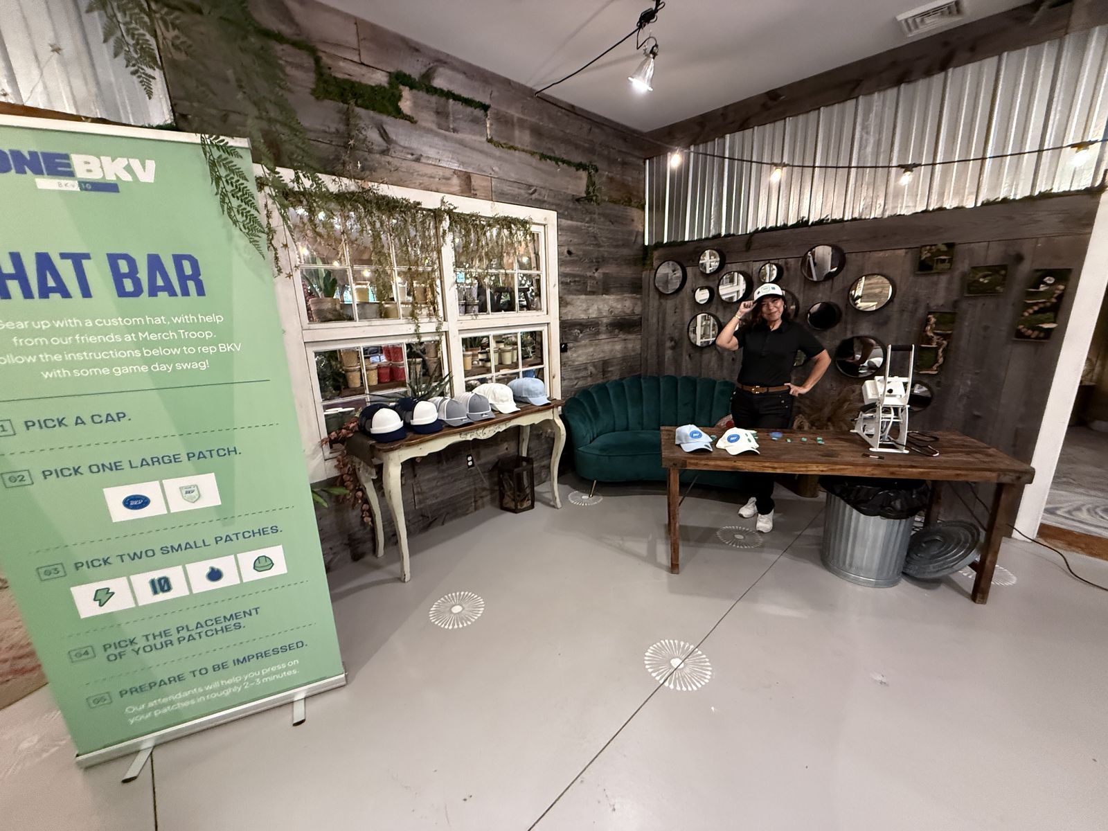 Hat bar set up in a party lounge with guests mingling nearby