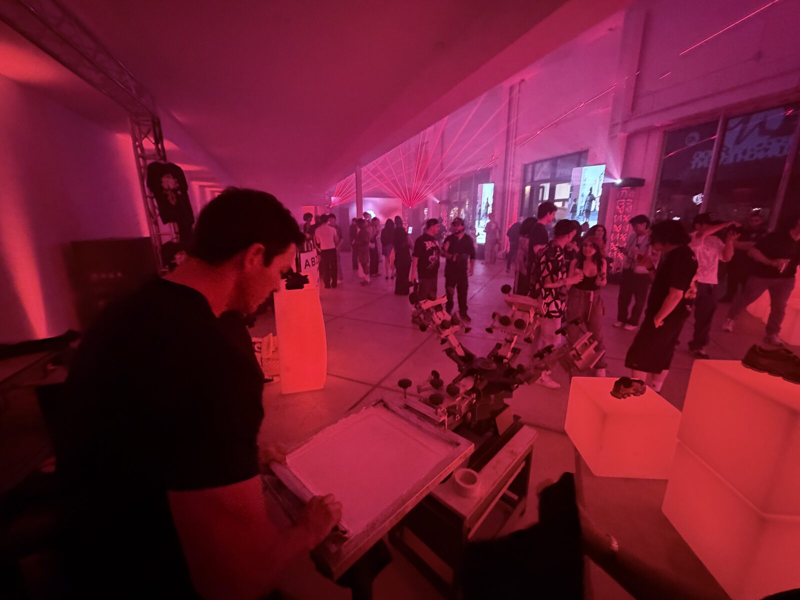 Live customization station glowing at a late night party